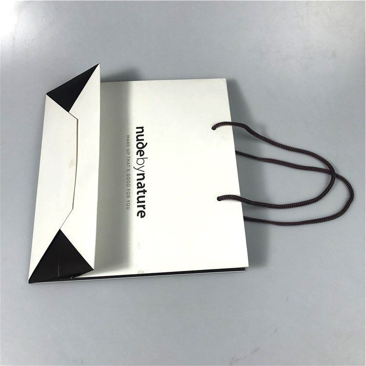 COMESTIC SHOPPING PAPER BAG WITH BRAND logo