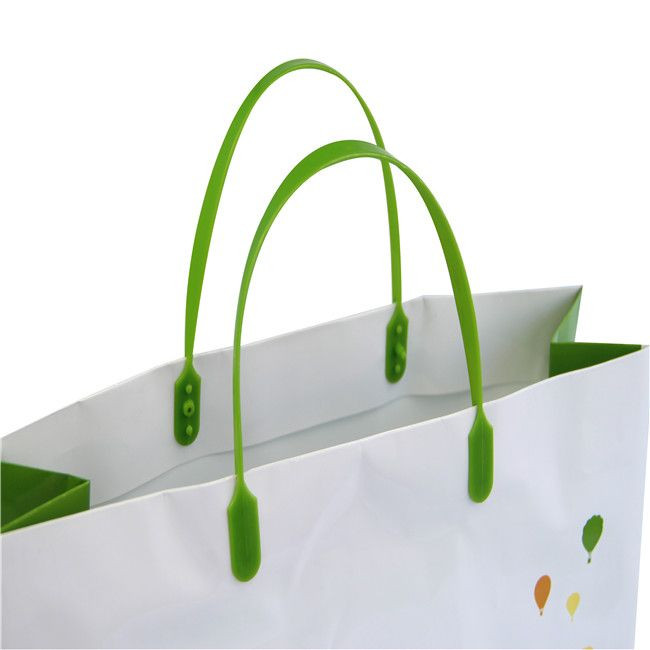 PRINTED PAPER BAG WITH PLASTIC HANDLE