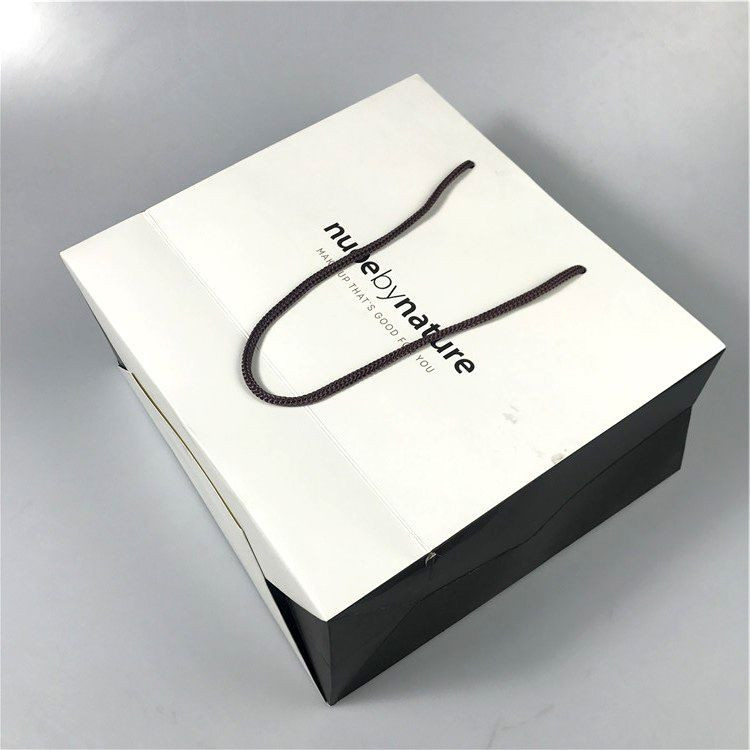 COMESTIC SHOPPING PAPER BAG WITH BRAND logo